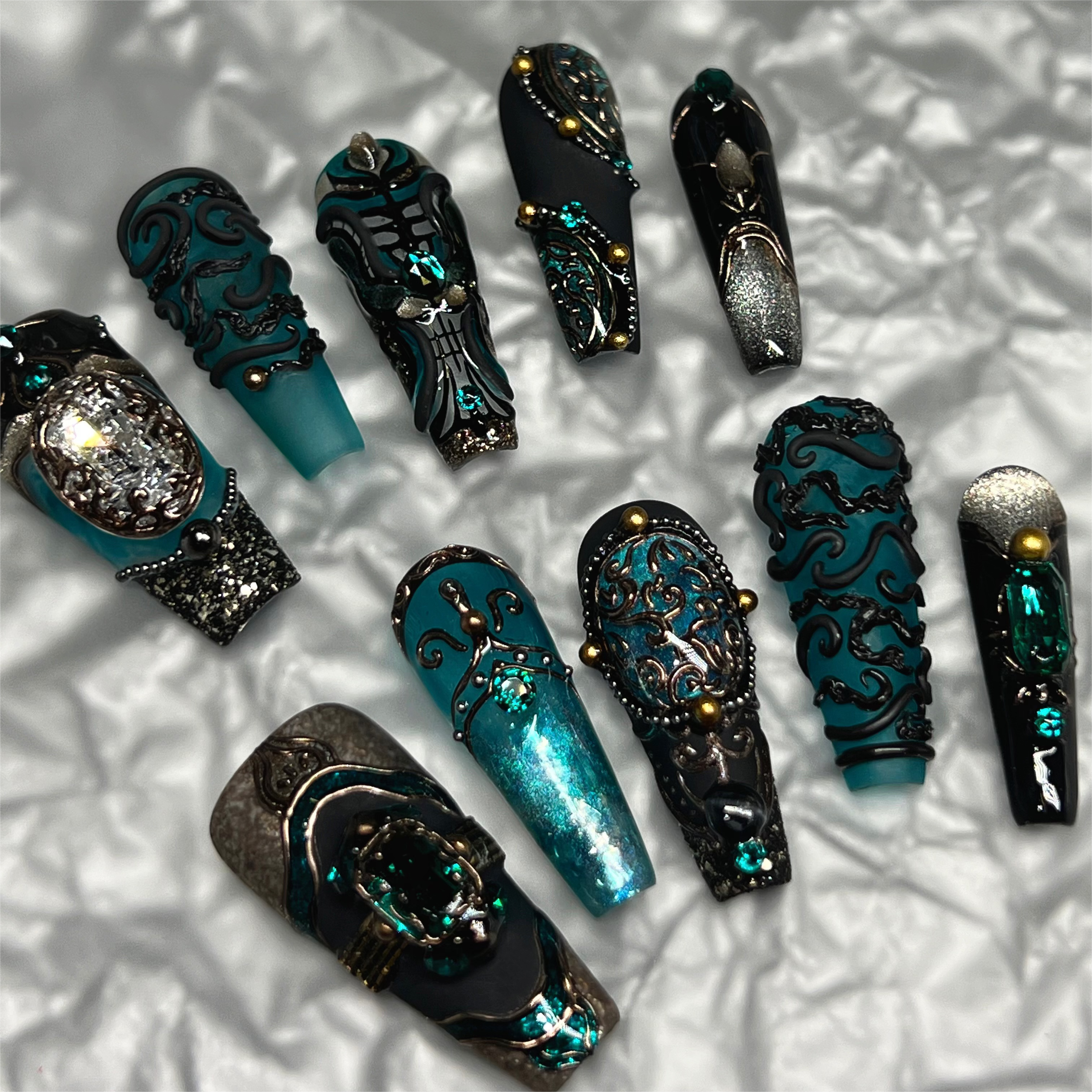 Premium black and green stiletto nails by Sivadesignart with elegant and detailed designs